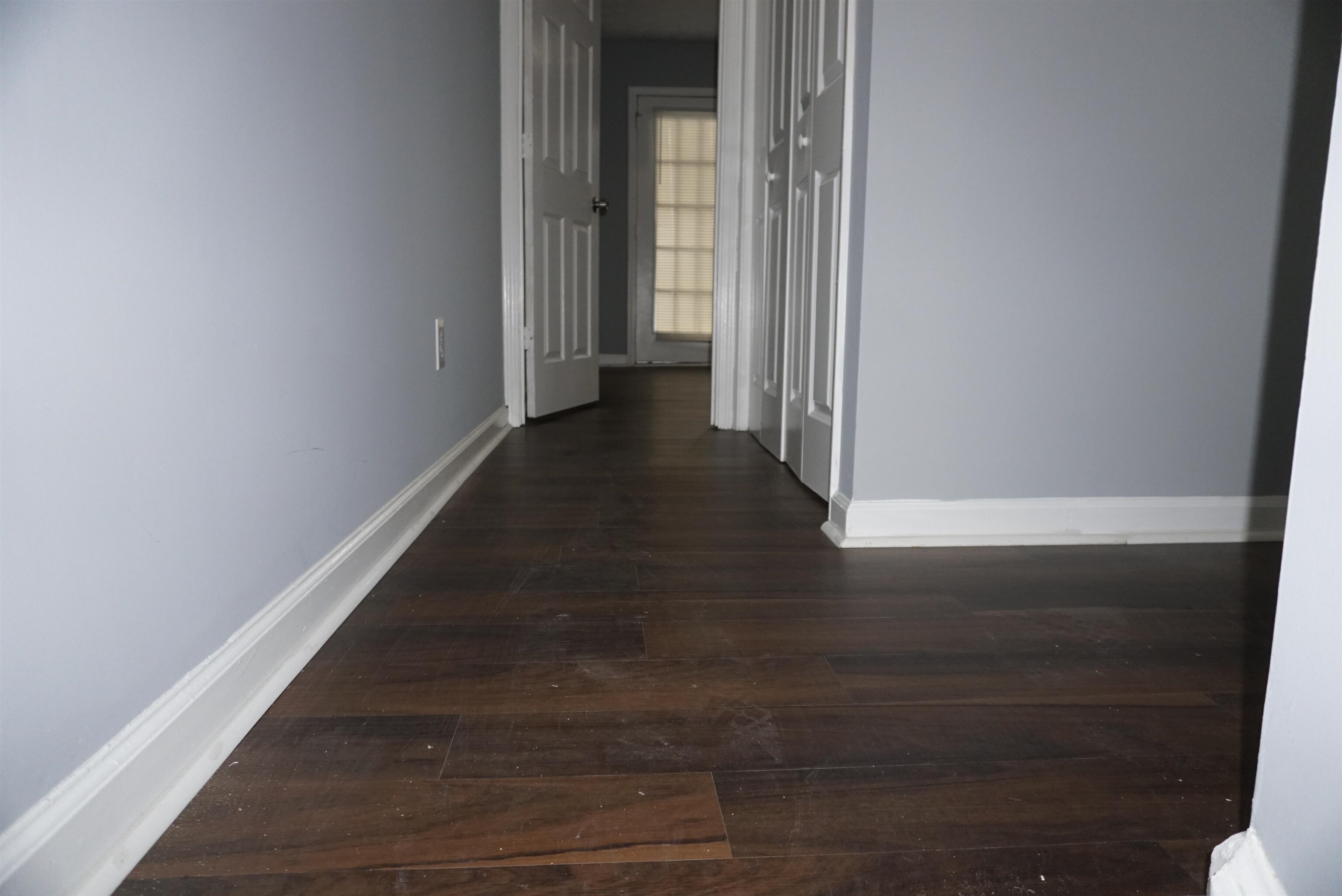 5489 South Park Place Atlanta, GA 30349 - Photo 22 of 37 a view of a hallway with wooden floor