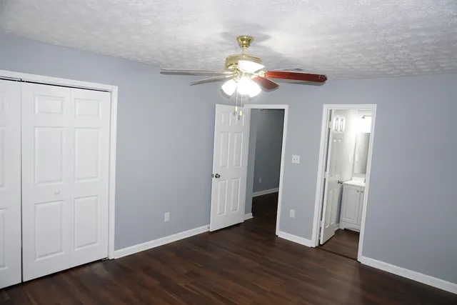 a view of a livingroom with wooden floor