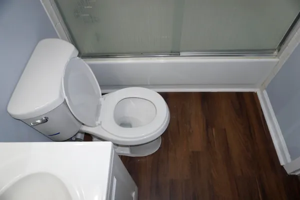 a bathroom with a toilet and a sink