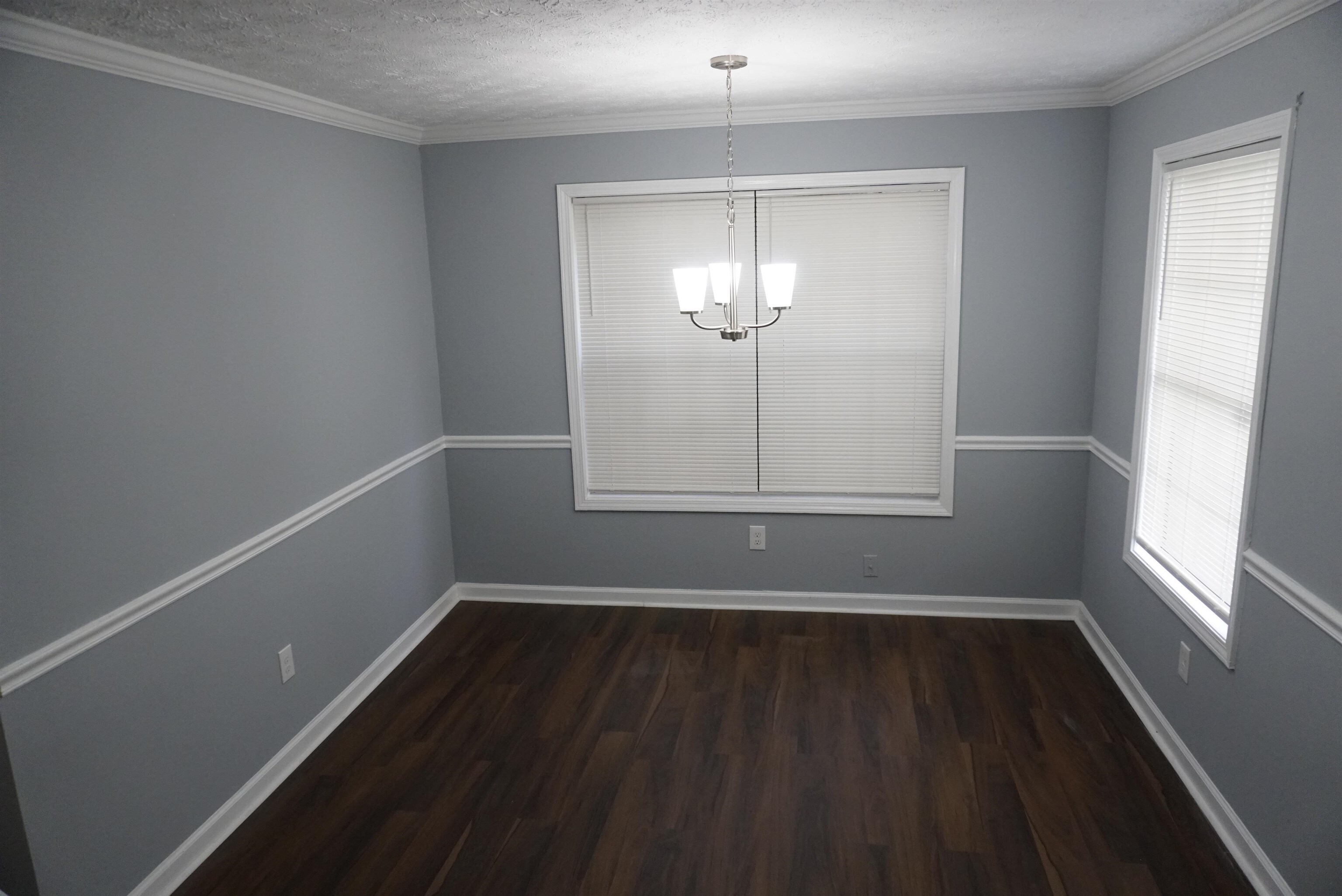 5489 South Park Place Atlanta, GA 30349 - Photo 7 of 37 wooden floor in an empty room with a window