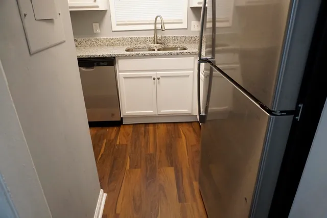 a bathroom with a sink and mirror