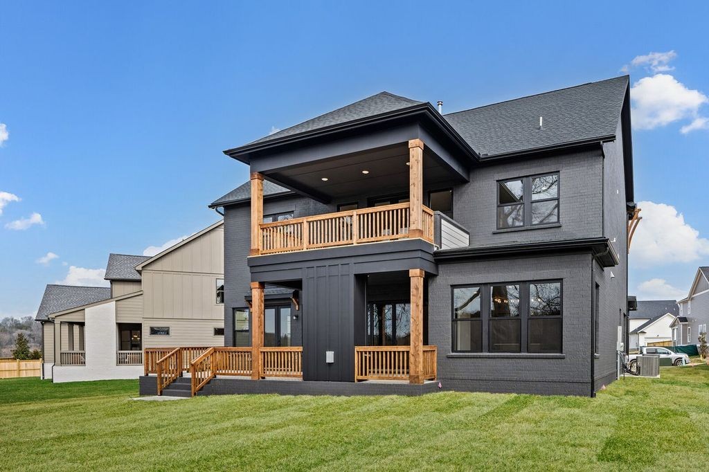 5133 Rambler Loop Franklin, TN 37064 - Photo 4 of 20 a front view of a house with a yard