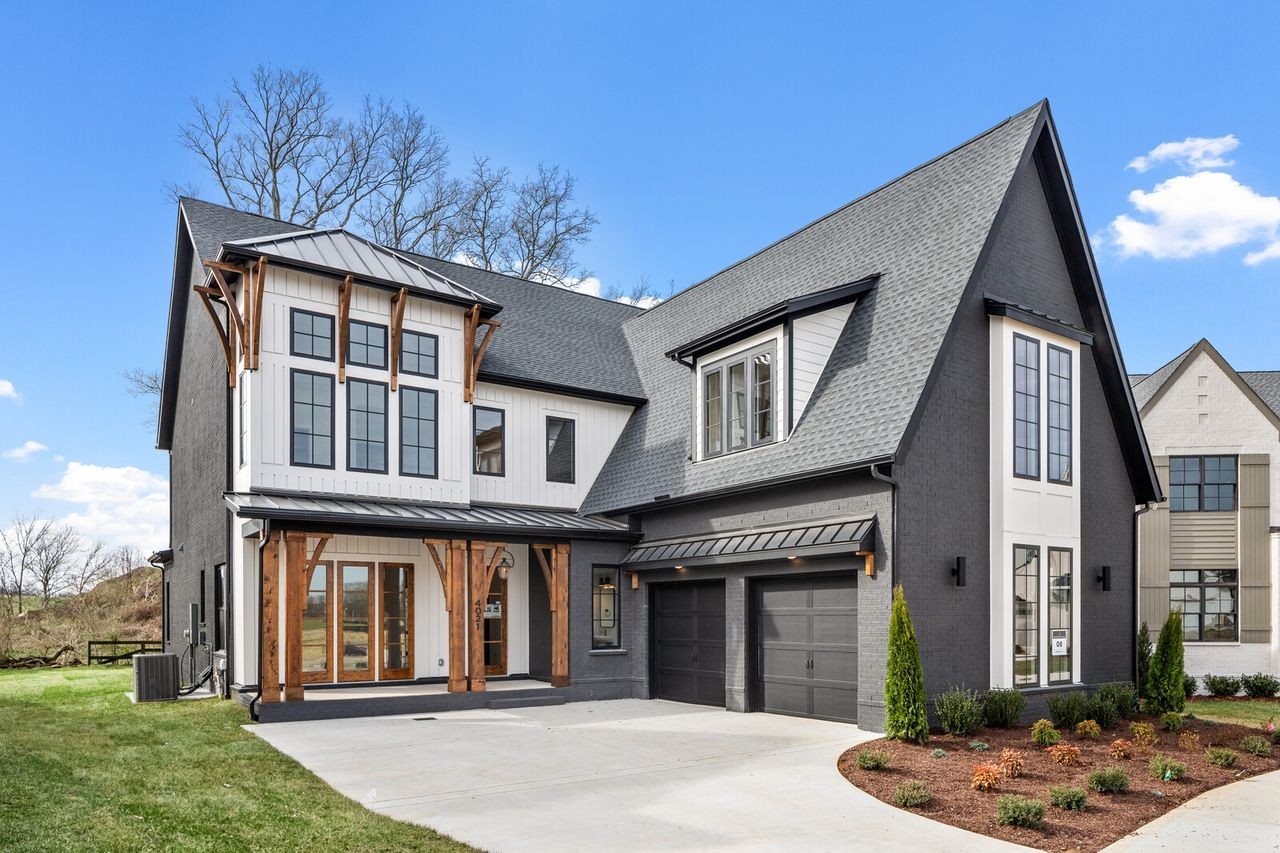 5133 Rambler Loop Franklin, TN 37064 - Photo 5 of 20 a front view of a house with garden