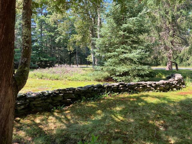548 Point Road Hancock, ME 04640 - Photo 37 of 47 Stone wall lining driveway.