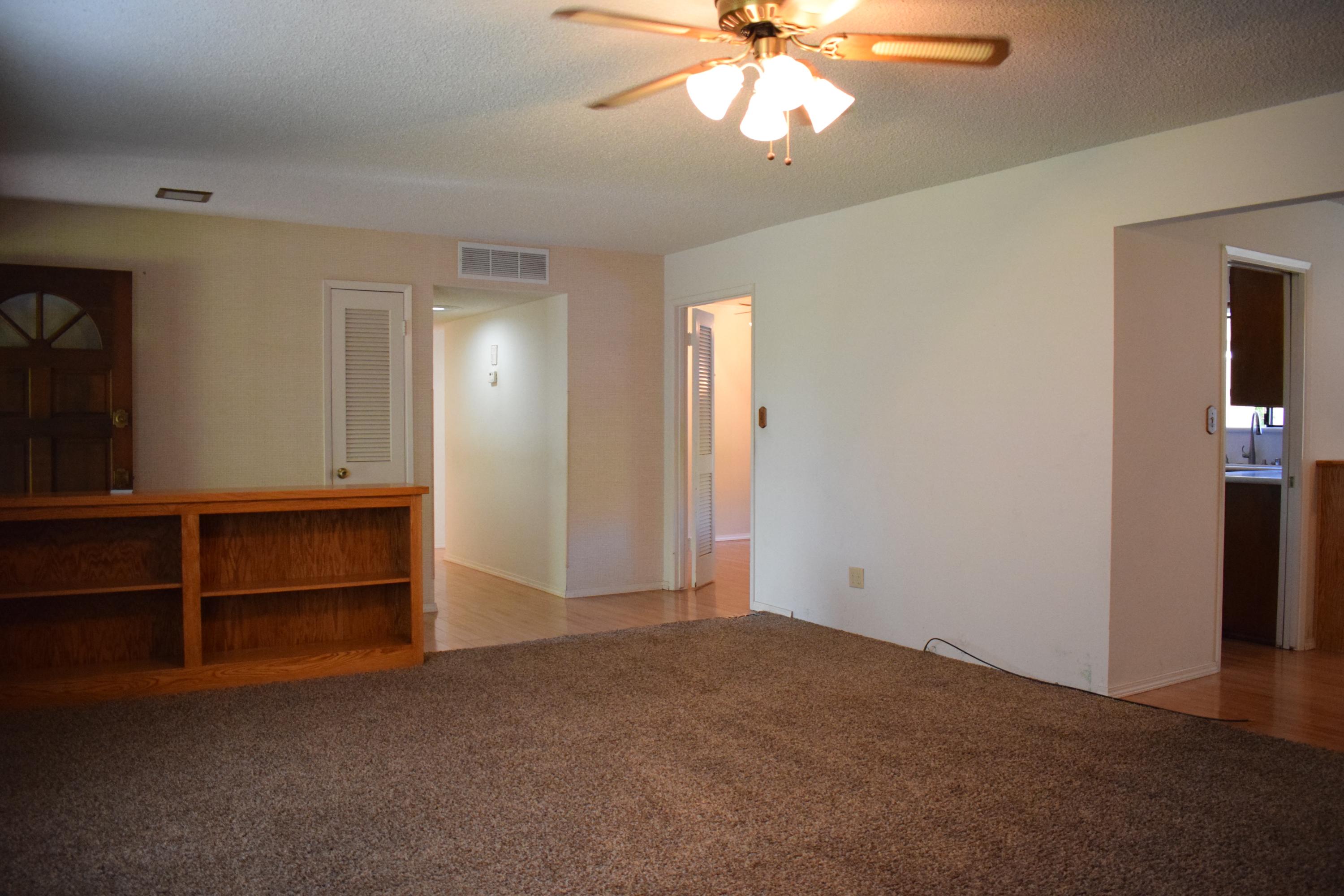 8585 Redbank Road Redding, CA 96001 - Photo 11 of 37 a view of an empty room with a window