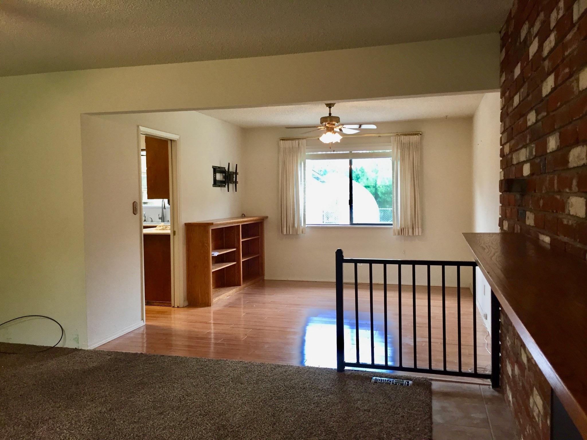 8585 Redbank Road Redding, CA 96001 - Photo 10 of 37 an empty room with windows