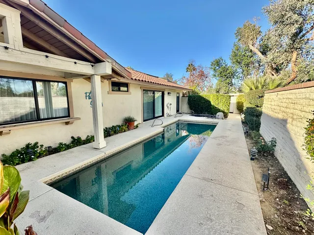 a view of a house with a swimming pool