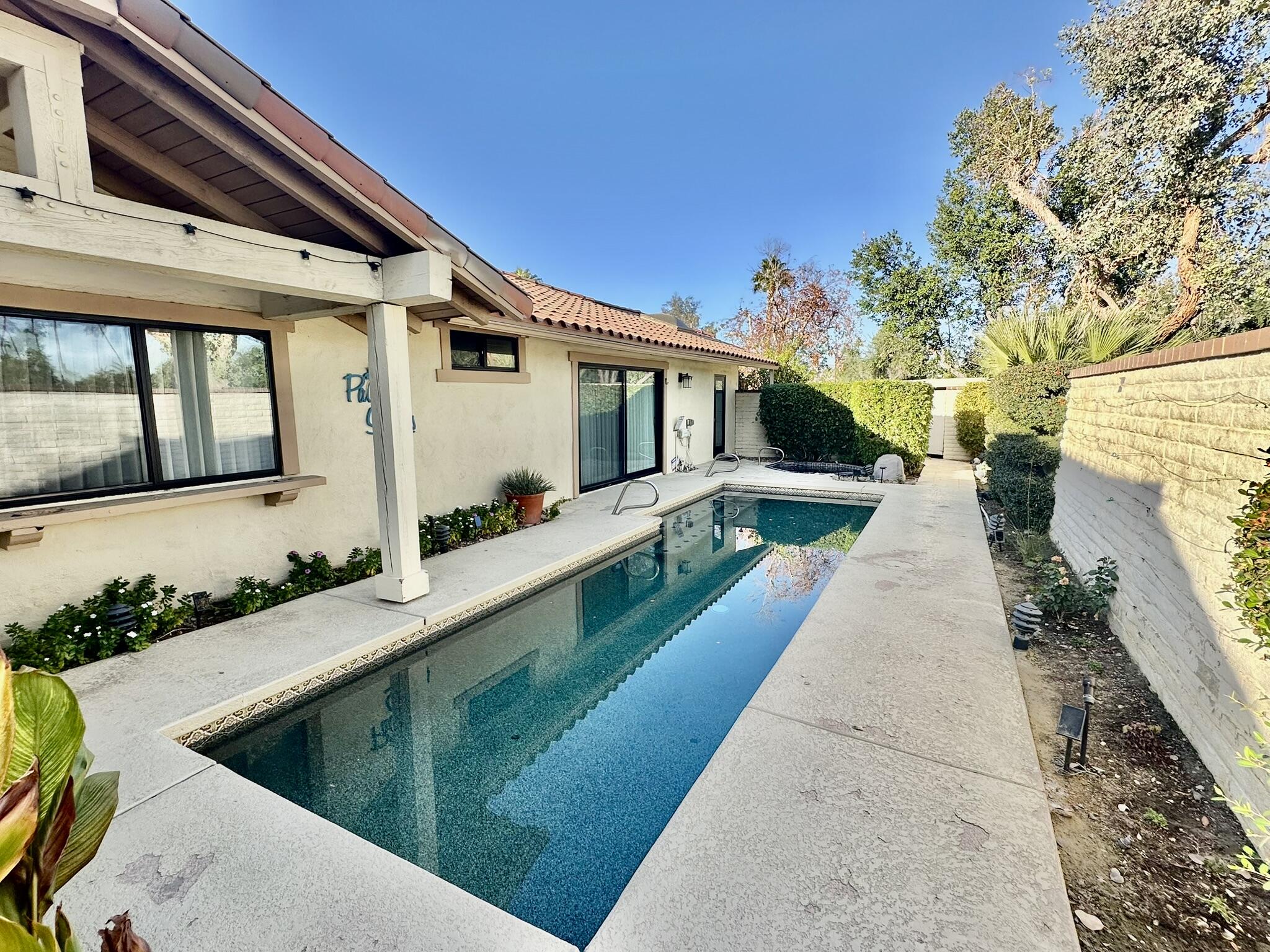 a view of a house with a swimming pool