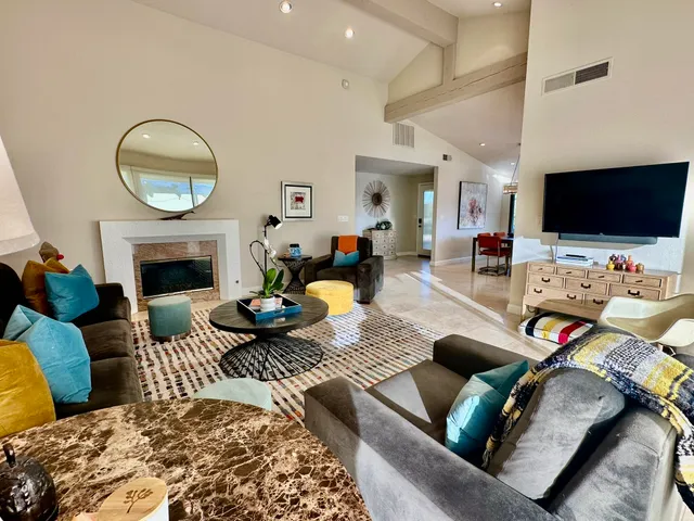 a spacious bedroom with a bed and window