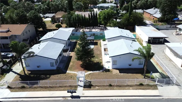 an aerial view of residential house with outdoor space