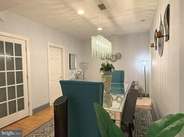 a view of a living room and dining room