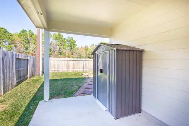 a view of a backyard with garden