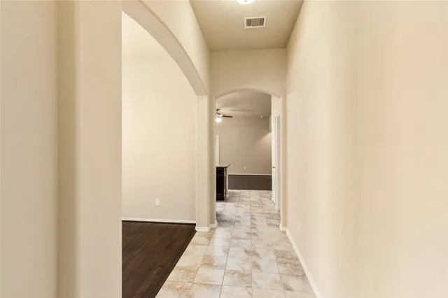 a view of a bathroom from a hallway