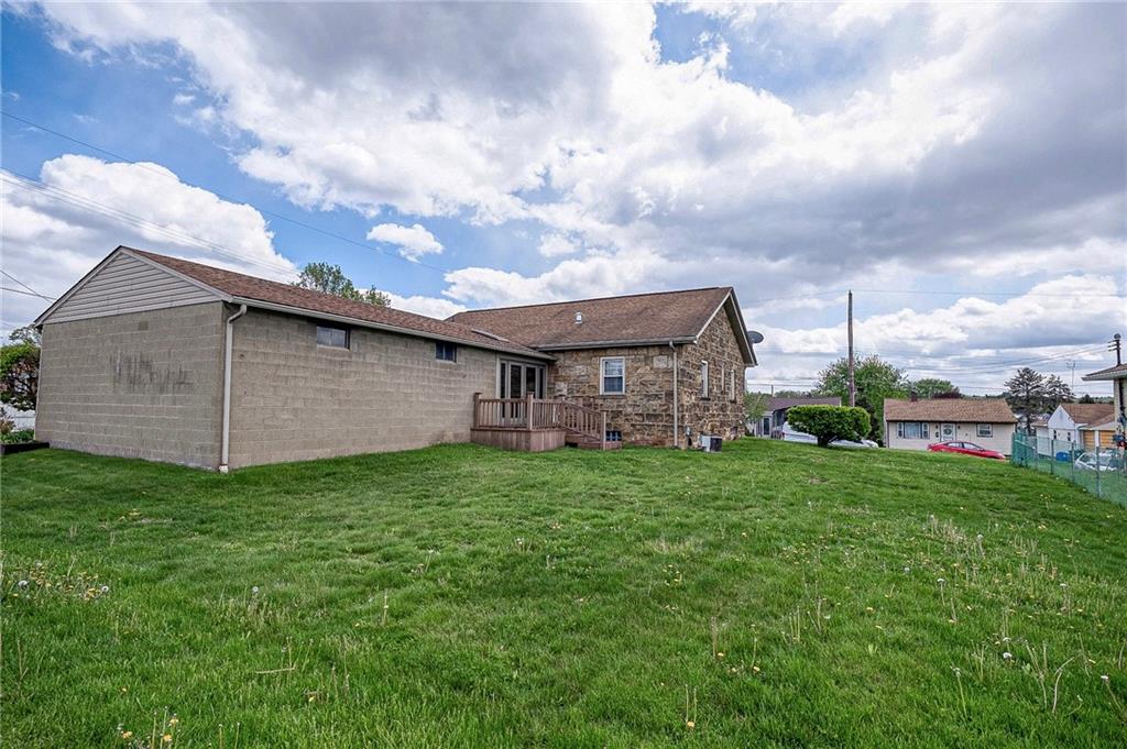 699 Kaye Avenue Monaca, PA 15061 - Photo 35 of 43 a backyard of a house with lots of green space