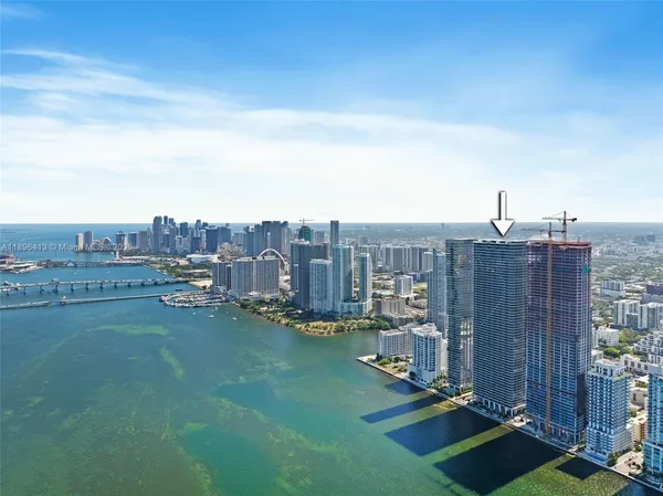 a view of a city with tall buildings