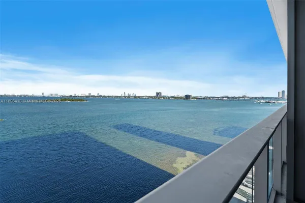 a view of a lake with a city view