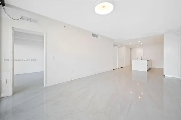 a view of a room with an empty space