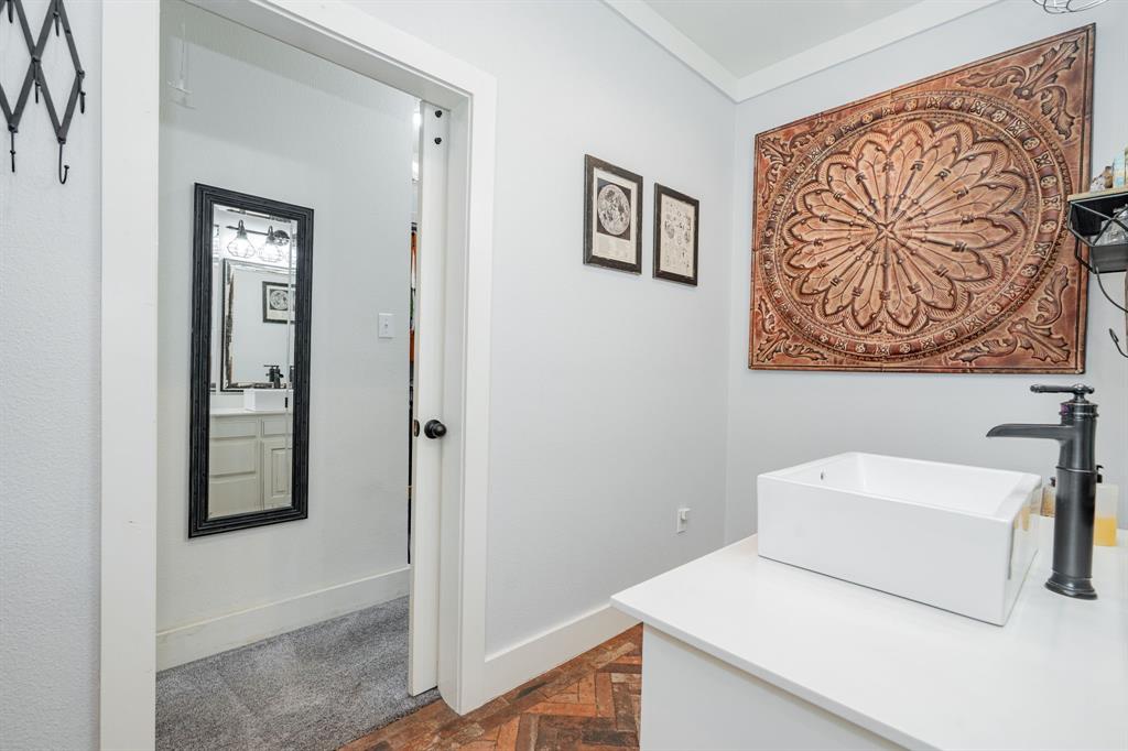 853 County Road 2215 Decatur, TX 76234 - Photo 13 of 39 Primary bathroom with vanity and baseboards