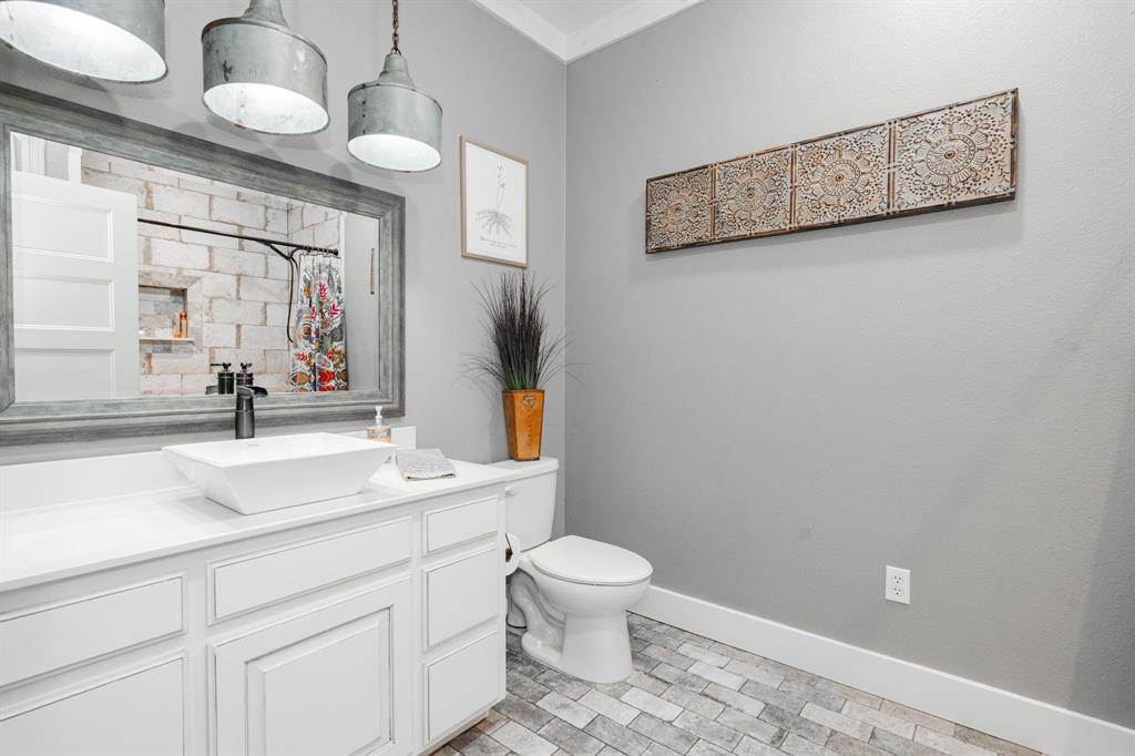 853 County Road 2215 Decatur, TX 76234 - Photo 18 of 39 Bathroom with vanity and curtained shower