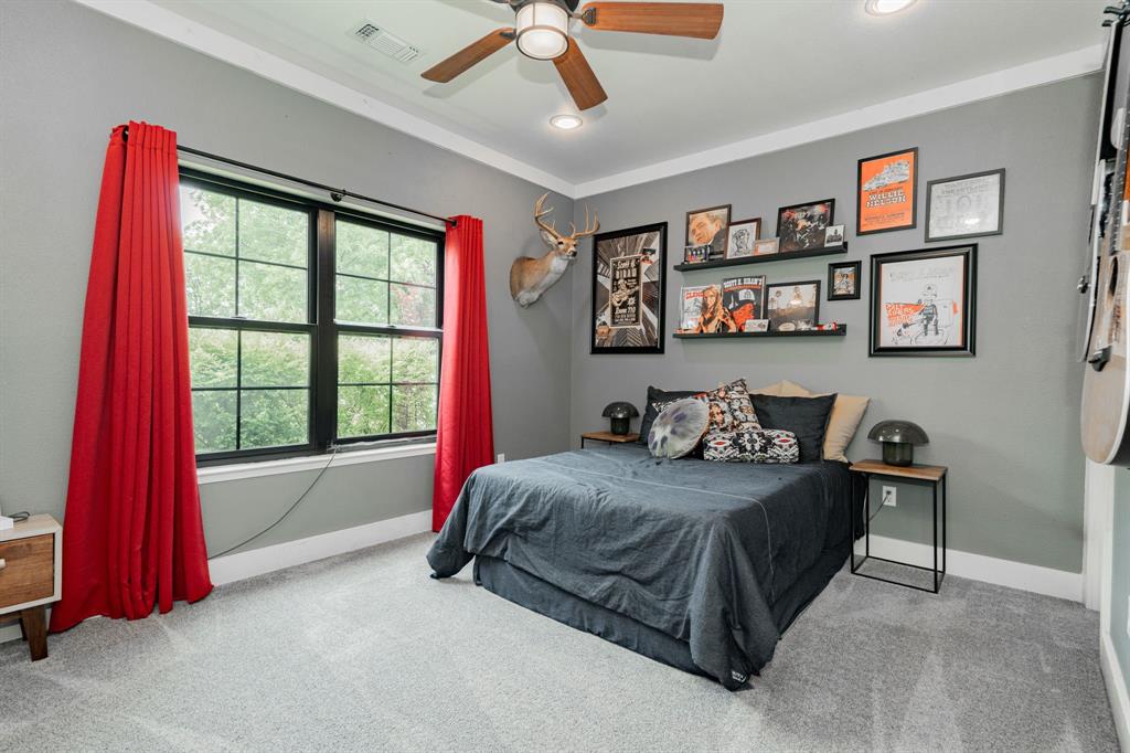 853 County Road 2215 Decatur, TX 76234 - Photo 20 of 39 Bedroom with light carpet, a ceiling fan, and recessed lighting