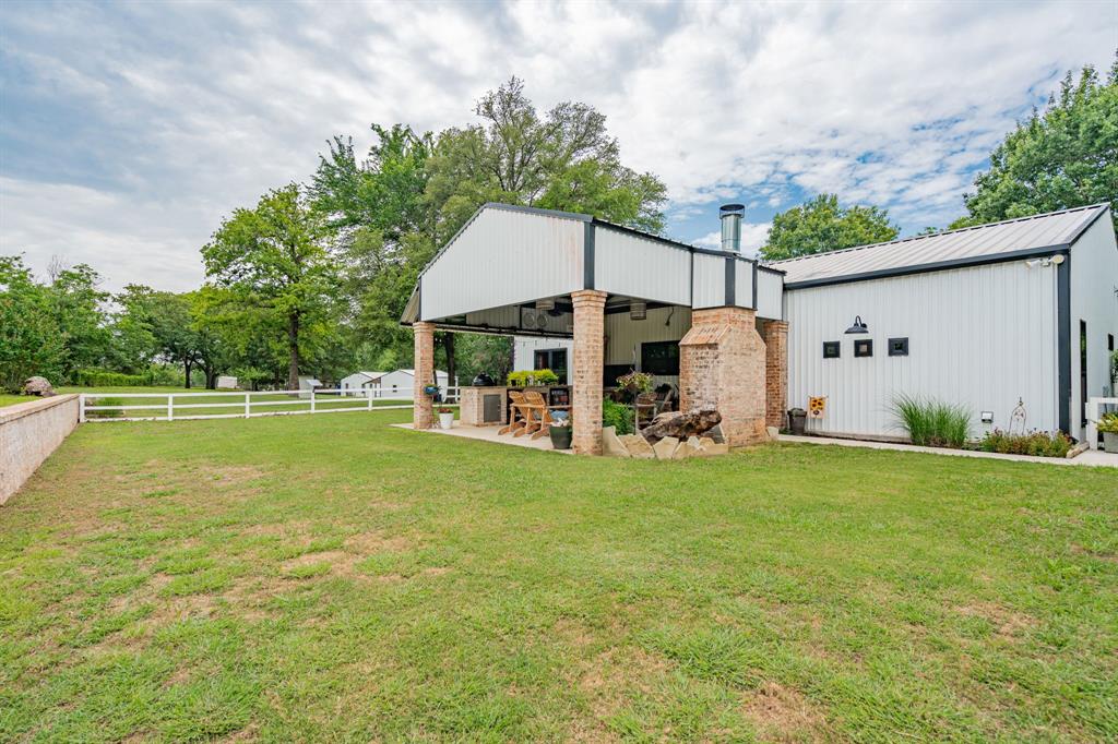 853 County Road 2215 Decatur, TX 76234 - Photo 26 of 39 Fenced yard with a patio area