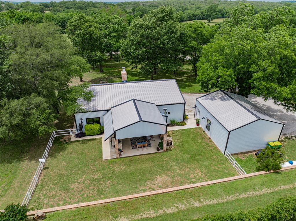 853 County Road 2215 Decatur, TX 76234 - Photo 3 of 39 an aerial view of a house with a yard
