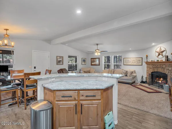 a room with furniture and a fireplace