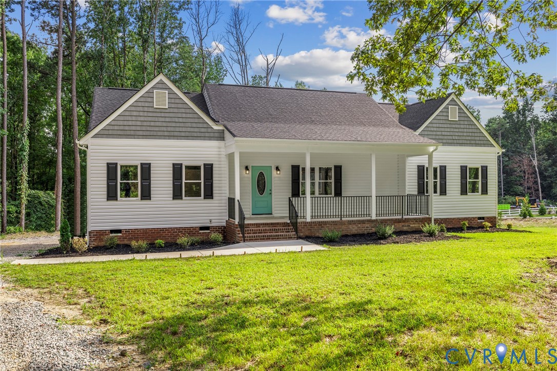 2211 Osborne Road Chester, VA 23831 - Photo 34 of 42 Front porch with white columns and dark railing, t