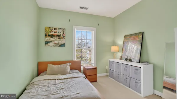 a room with cabinet and a window