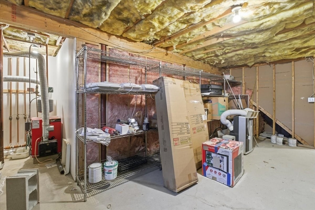 133 Grove Street Bellingham, MA 02019 - Photo 24 of 42 a utility room with lot of furniture