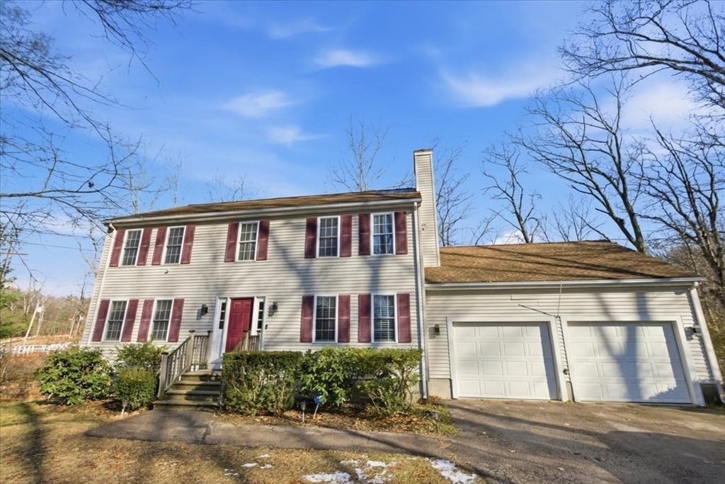 133 Grove Street Bellingham, MA 02019 - Photo 38 of 42 a front view of a building