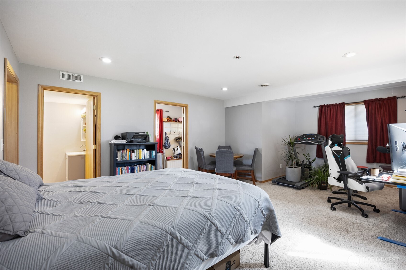 55790 Lake Ridge Lane Electric City, WA 99123 - Photo 15 of 35 a bedroom with a bed a large window and furniture