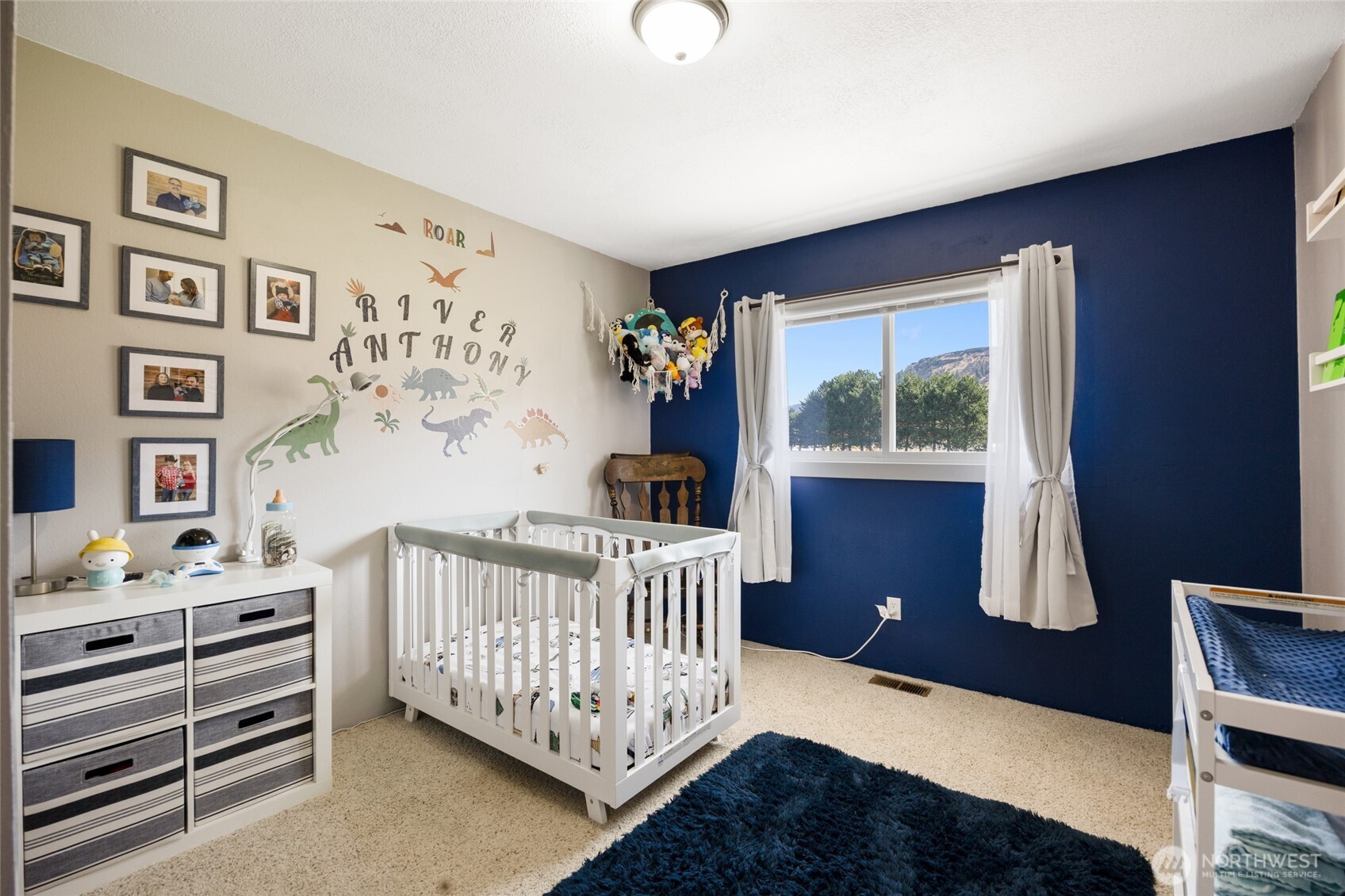 55790 Lake Ridge Lane Electric City, WA 99123 - Photo 22 of 35 a bedroom with furniture and baby crib