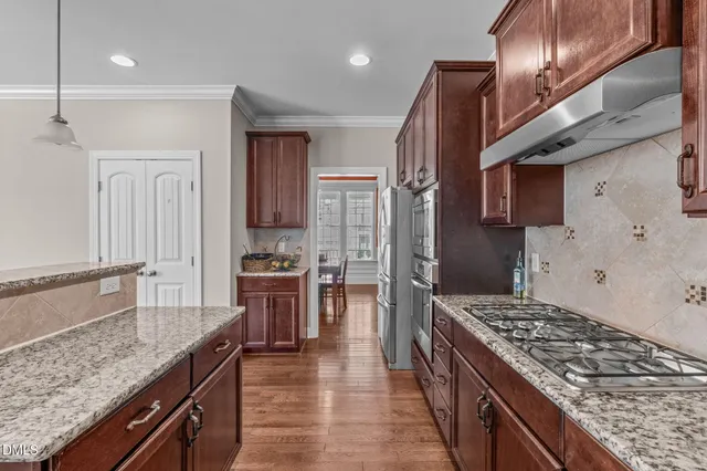 a view of a workspace with furniture