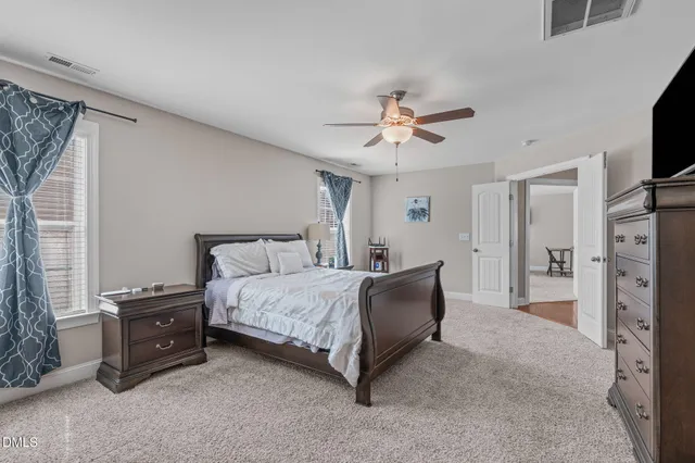 a bathroom with a double vanity sink mirror and double