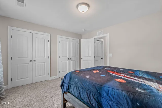 an aerial view of a house with swimming pool
