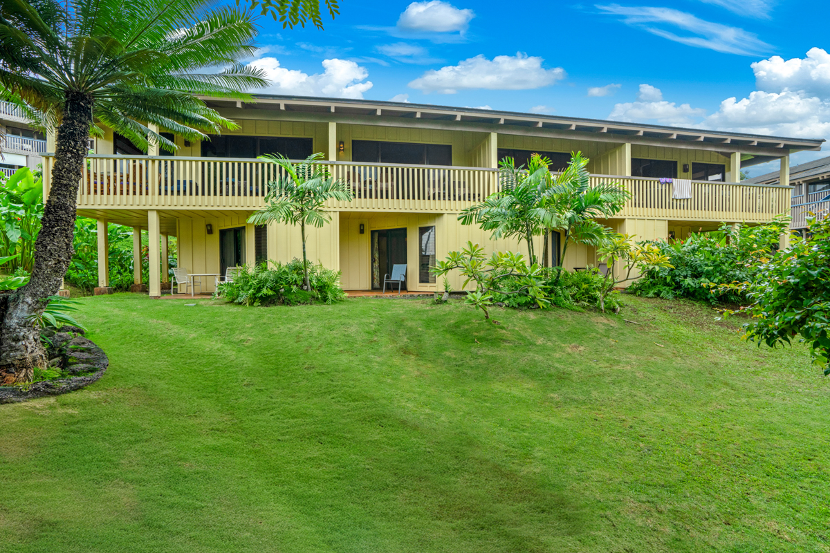 1870 Hoone Road, Unit 602 Koloa, HI 96756 - Photo 18 of 22 a front view of a house with a yard
