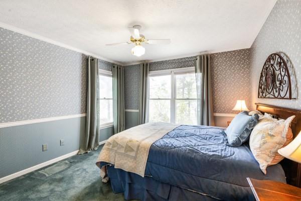 167 Edgewater Drive Temple, GA 30179 - Photo 24 of 37 a bedroom with a large bed and a window
