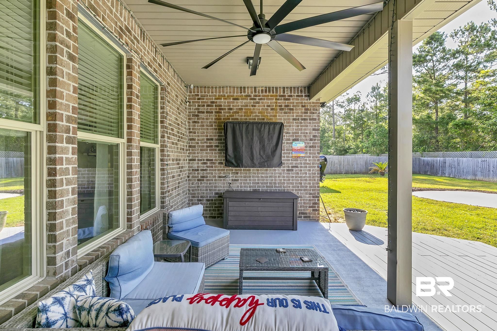 30635 Drayton Court Daphne, AL 36527 - Photo 37 of 51 View of patio / terrace featuring a ceiling fan and an outdoor hangout area