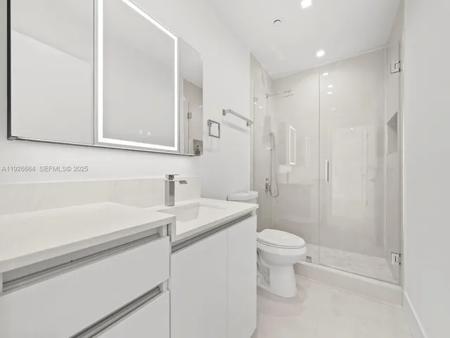 an empty room with closet area