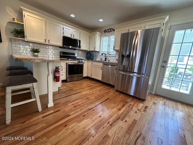 187 Topside Road Manahawkin, NJ 08050 - Photo 20 of 66 a kitchen with stainless steel appliances a refrigerator sink and microwave