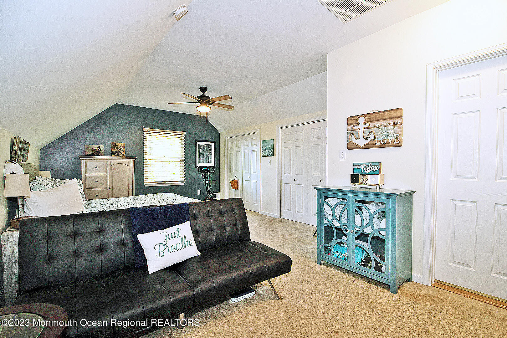 187 Topside Road Manahawkin, NJ 08050 - Photo 48 of 66 a living room with furniture and painting on the wall