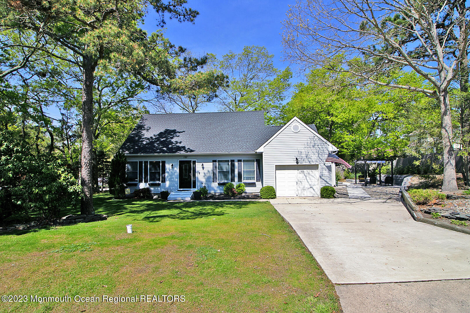 187 Topside Road Manahawkin, NJ 08050 - Photo 9 of 66 a front view of house with yard and green space