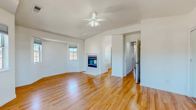 a bath room with a toilet and a bath tub