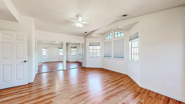 a bathroom with a sink double vanity and a mirror