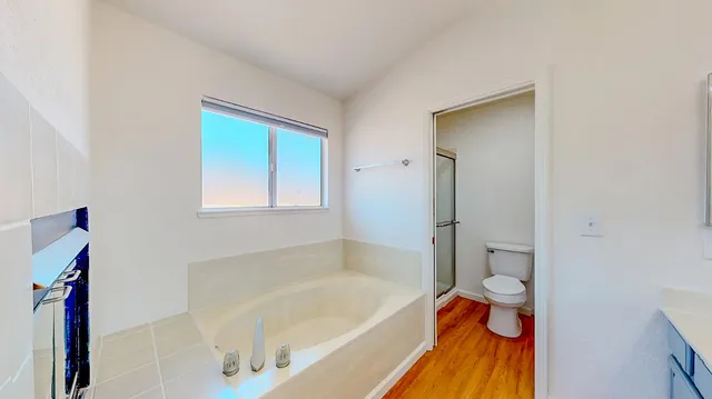 a view of a porch with furniture and a backyard