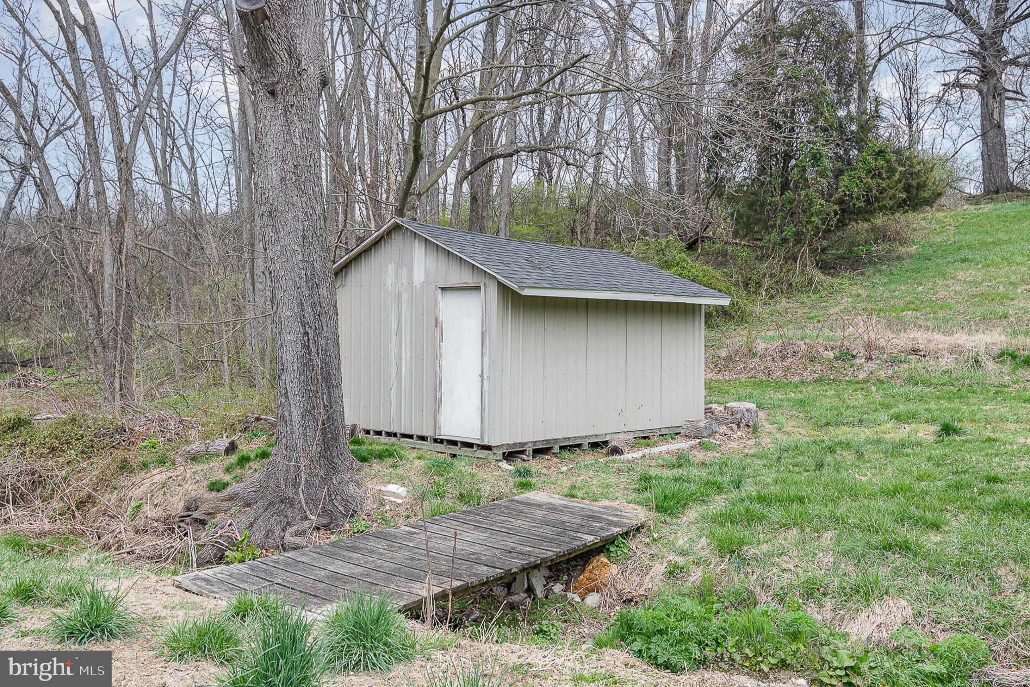 5495 Lehman Road Spring Grove, PA 17362 - Photo 26 of 34 a front view of a house with garden