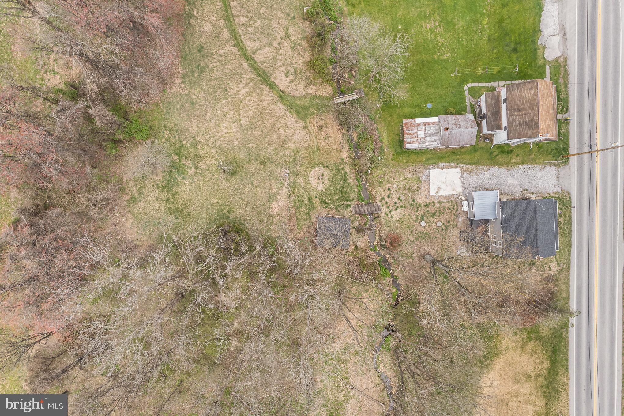 5495 Lehman Road Spring Grove, PA 17362 - Photo 31 of 34 a bathroom with a shower curtain