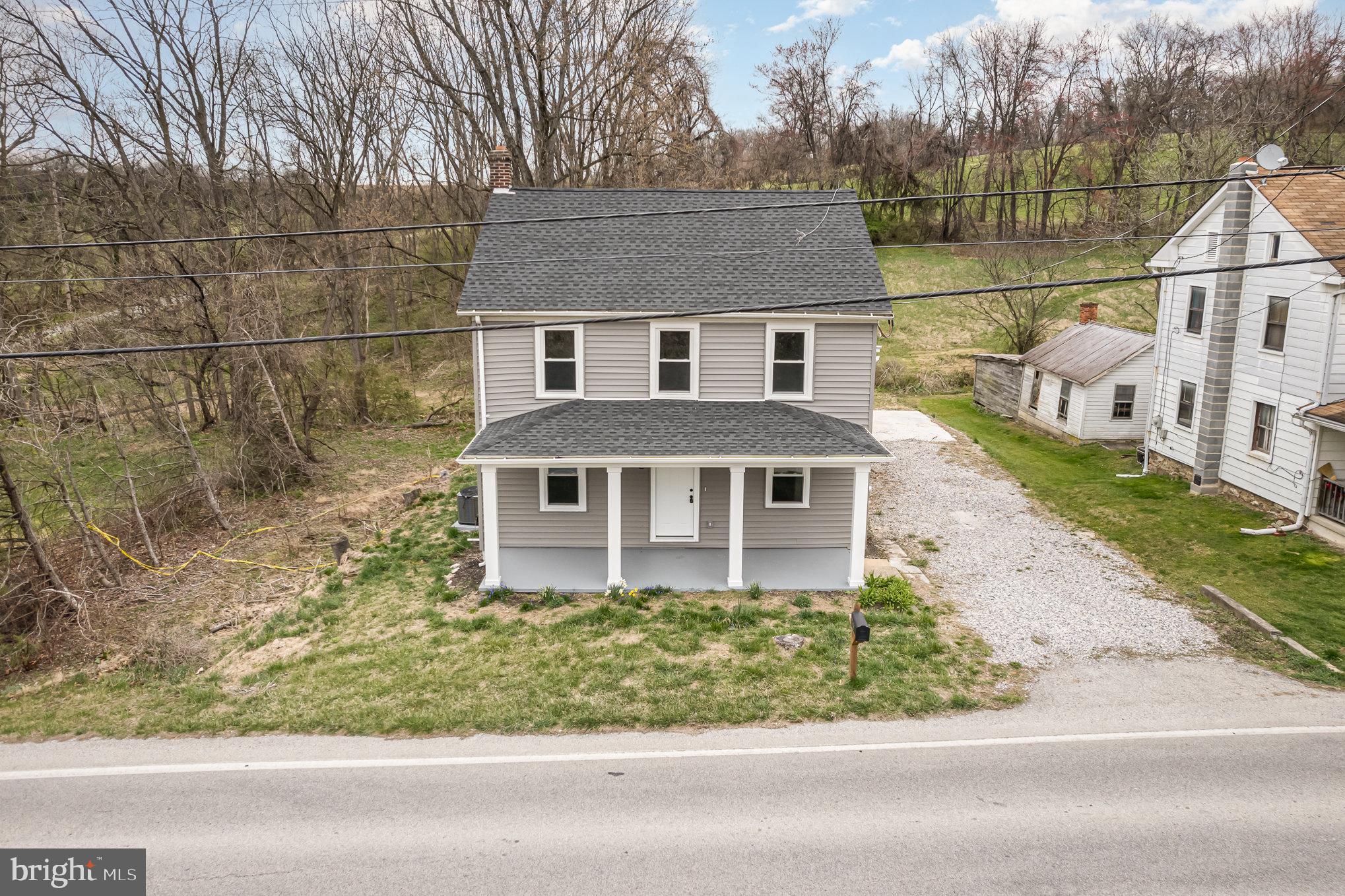 5495 Lehman Road Spring Grove, PA 17362 - Photo 34 of 34 front view of a house with a yard