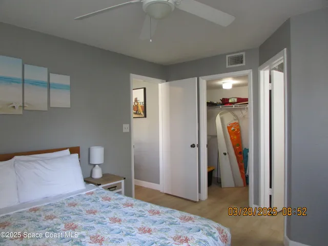 a view of a fountain in front of a big yard